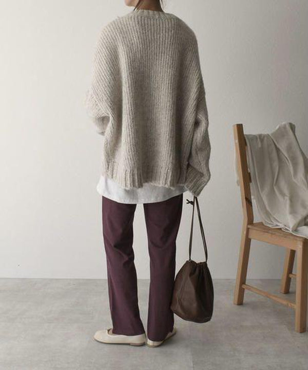 FallStil - Oversize Pullover mit elfenbeinfarbener Taschenfront