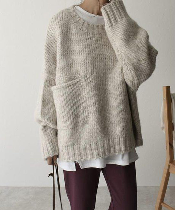 FallStil - Oversize Pullover mit elfenbeinfarbener Taschenfront
