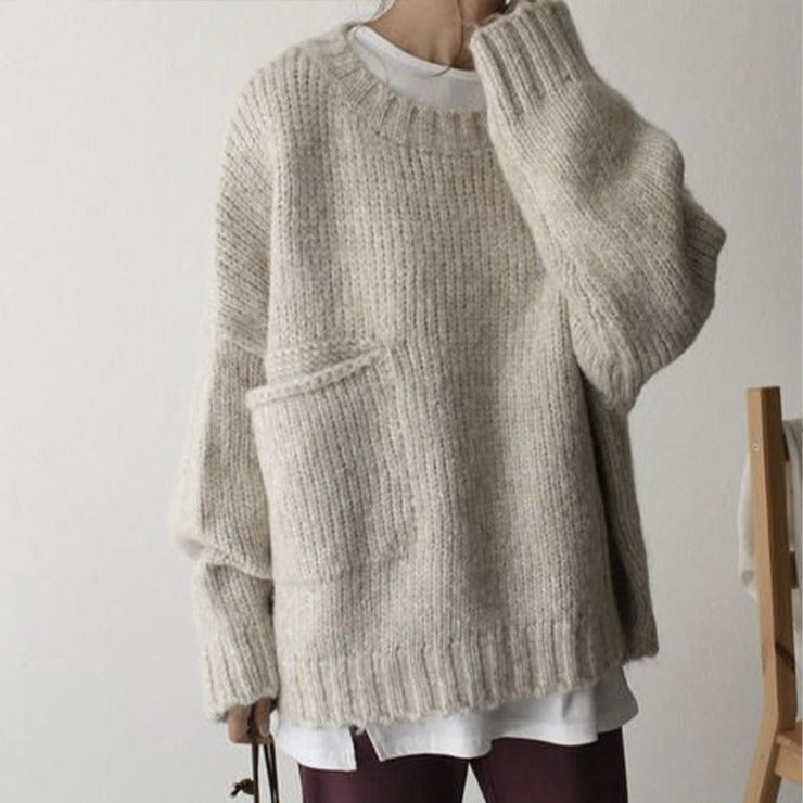 FallStil - Oversize Pullover mit elfenbeinfarbener Taschenfront