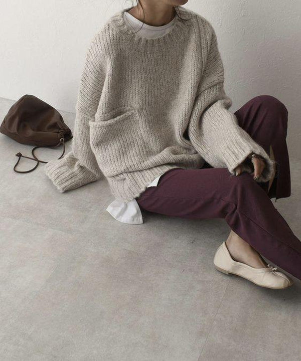 FallStil - Oversize Pullover mit elfenbeinfarbener Taschenfront