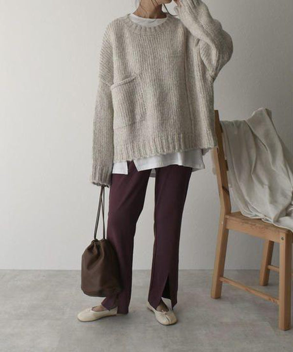 FallStil - Oversize Pullover mit elfenbeinfarbener Taschenfront