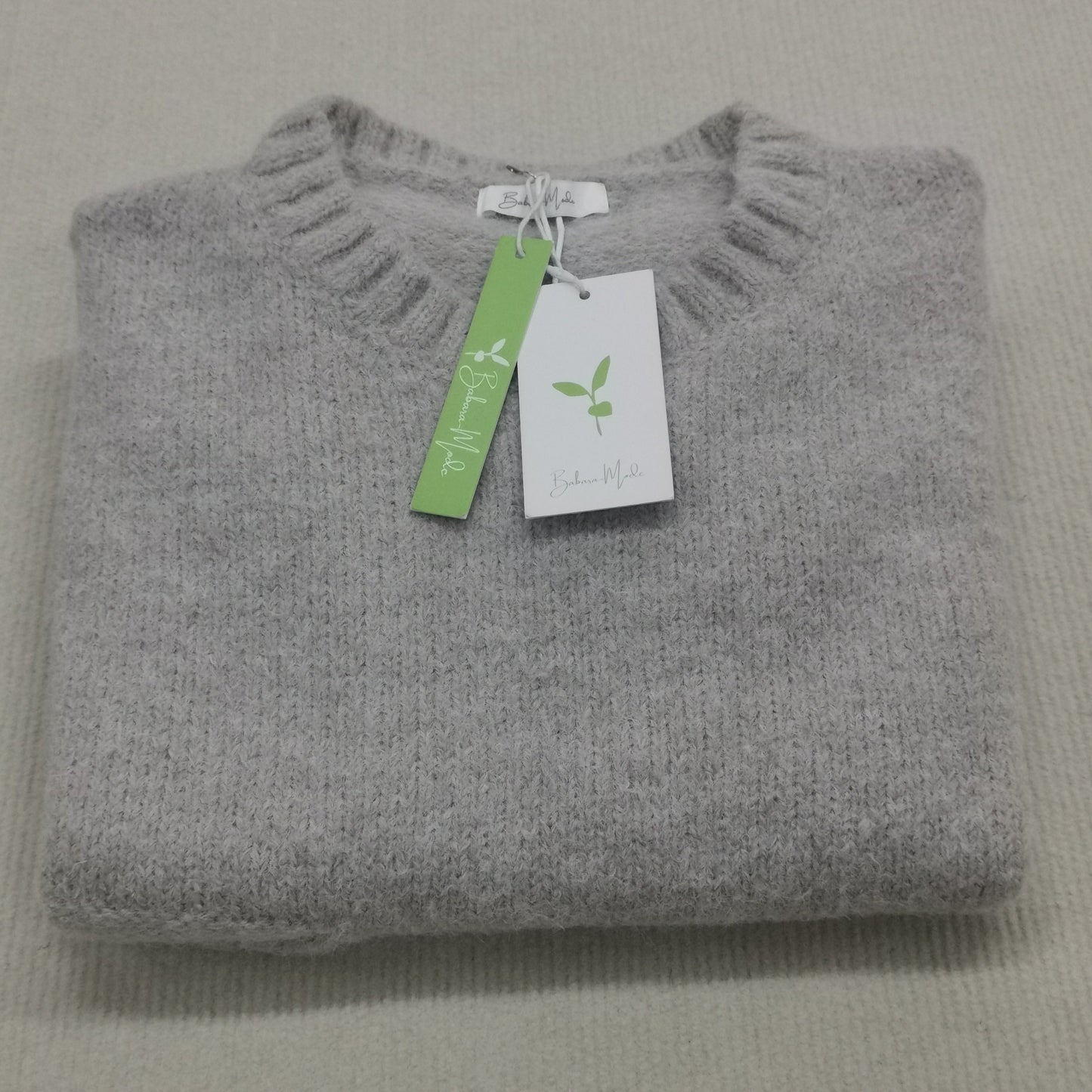 FallStil - Oversize Pullover mit elfenbeinfarbener Taschenfront